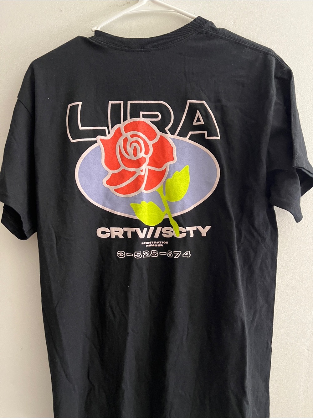 Lira Black Tee with Red Rose and Lime Stem Back Graphic